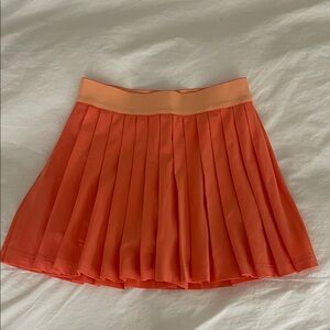 Athleta Girl Orange Pleated Tennis Skirt size 7